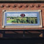 12 Riverside Terrace Storefront Sign