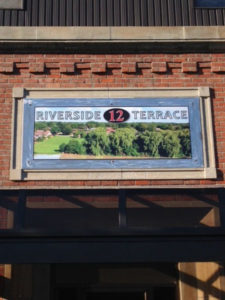 12 Riverside Terrace Storefront Sign